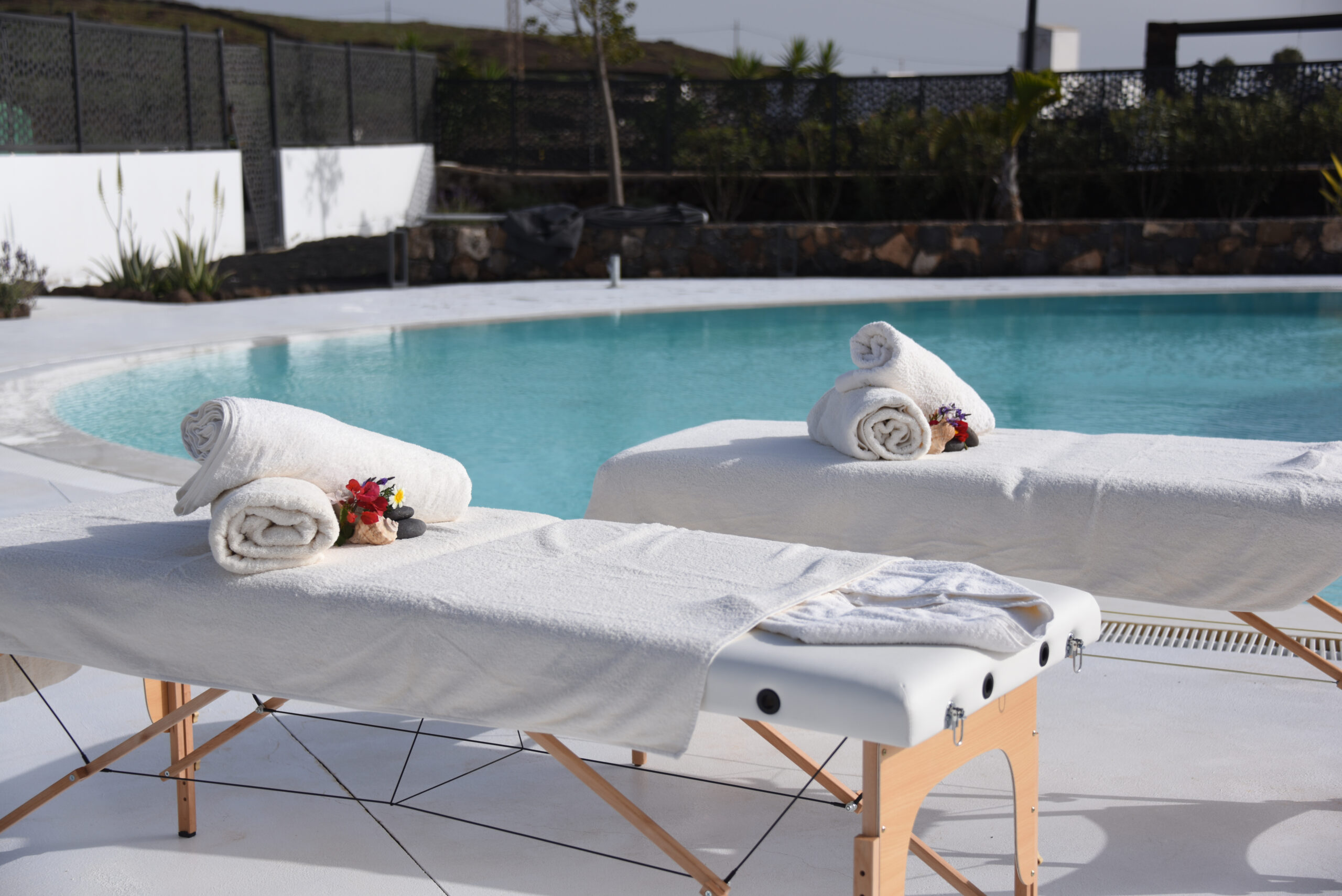 Portable massage tables on the poolside